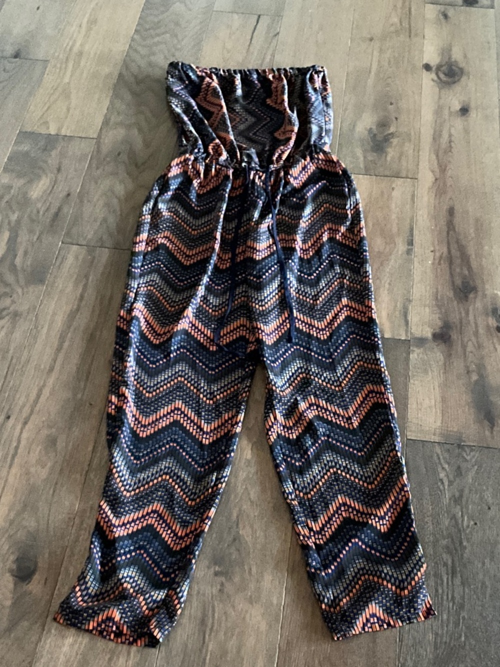 Blu Pepper Strapless Chevron Jumpsuit in Black & Orange